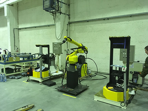 робот Fanuc роботизированный комплекс Fanuc роботизированная горелка Dinse